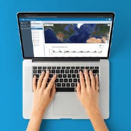 Graphic illustration of a laptop sharing data to and from a cloud
